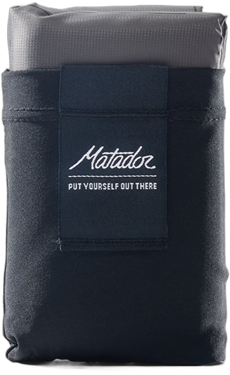 Matador Pocket Blanket black folded in its pocket pouch
